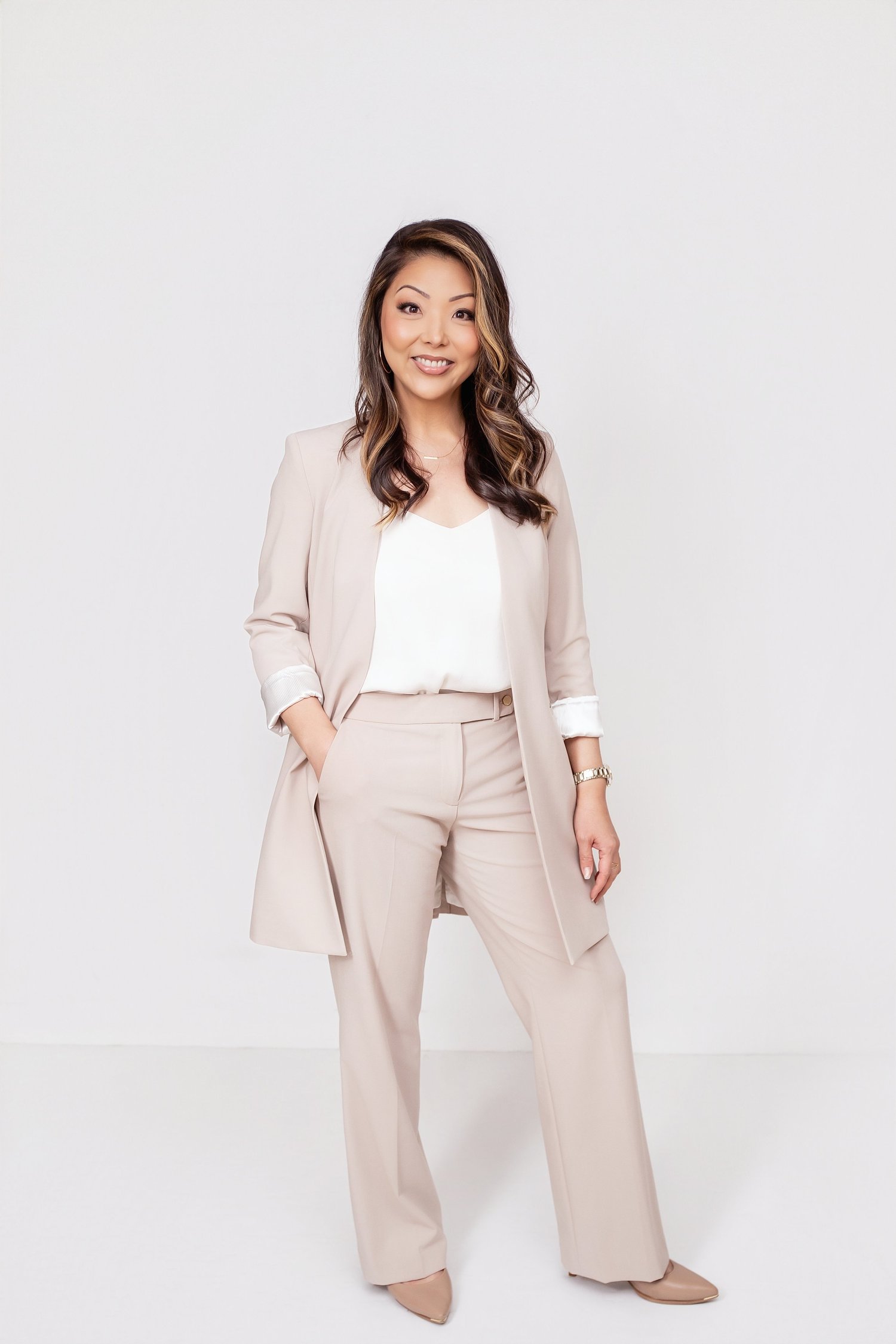 Chenise Kanemoto in a light tailored suit